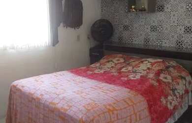 Imagem: A casa possui 2 Dormitórios e 1 Banheiro e está localizado