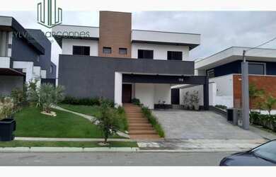 Imagem: A casa em condomínio possui 4 Dormitórios, 4 Banheiros, 1