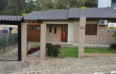 Imagem: A casa possui 3 Dormitórios, 3 Banheiros, 3 Vagas na garagem