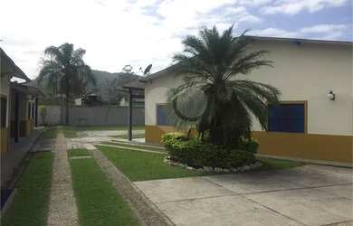 Imagem: A casa em condomínio possui 2 Dormitórios, 1 Banheiro, 2 Vagas