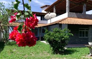 Imagem: A casa possui 2 Dormitórios, 2 Banheiros, 5 Vagas na garagem