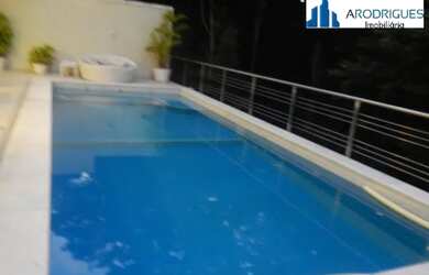 Imagem: A casa em condomínio possui 4 Dormitórios, 5 Banheiros, 4