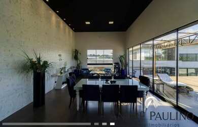 Imagem: A casa em condomínio possui 4 Dormitórios, 4 Banheiros e 400m²