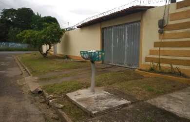 Imagem: A casa possui 4 Dormitórios, 2 Banheiros, 3 Vagas na garagem