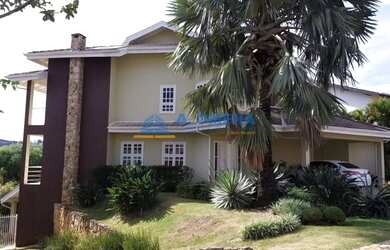 Imagem: A casa possui 5 Dormitórios, 5 Banheiros, 4 Vagas na garagem