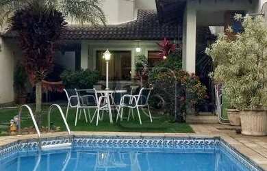 Imagem: A casa em condomínio possui 4 Dormitórios, 5 Banheiros, 4