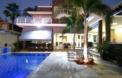 Imagem: A casa em condomínio possui 4 Dormitórios, 5 Banheiros, 4