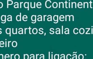 Imagem: Casa com jardim murada