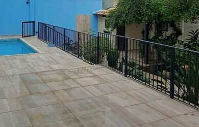 Imagem: A casa possui 5 Dormitórios, 4 Banheiros, 4 Vagas na garagem