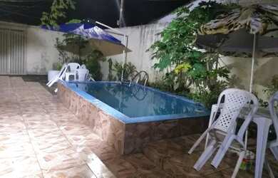 Imagem: A casa possui 4 Dormitórios, 4 Banheiros, 3 Vagas na garagem