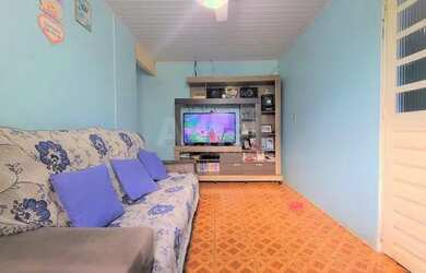 Imagem: A casa possui 2 Dormitórios, 1 Banheiro, 1 Vaga na garagem