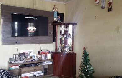 Imagem: A casa possui 2 Dormitórios, 1 Banheiro e está localizado