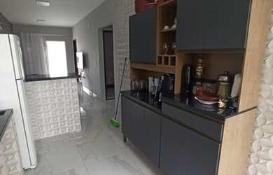 Imagem: A casa possui 3 Dormitórios, 2 Banheiros, 3 Vagas na garagem