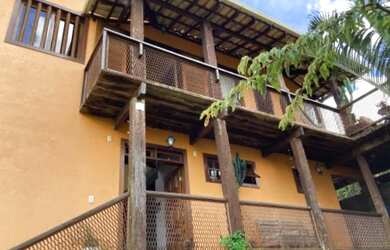 Imagem: A casa possui 2 Dormitórios, 3 Vagas na garagem e está localizado