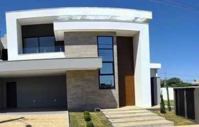 Imagem: A casa possui 3 Dormitórios, 2 Banheiros, 3 Vagas na garagem