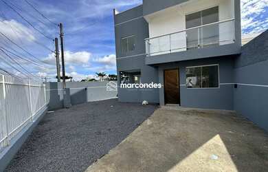 Imagem: A casa possui 2 Dormitórios, 2 Banheiros, 3 Vagas na garagem