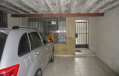 Imagem: A casa possui 3 Dormitórios, 2 Banheiros, 2 Vagas na garagem