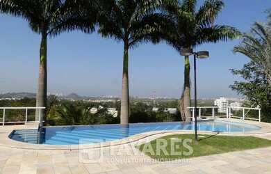 Imagem: A casa possui 4 Dormitórios, 5 Banheiros, 5 Vagas na garagem