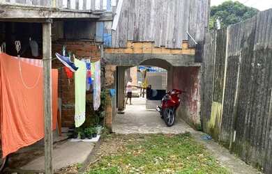 Imagem: A casa possui 2 Dormitórios, 2 Banheiros, 1 Vaga na garagem