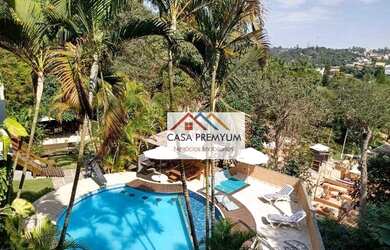 Imagem: A casa em condomínio possui 4 Dormitórios, 5 Banheiros, 5