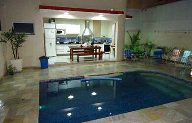 Imagem: A casa em condomínio possui 3 Dormitórios, 3 Banheiros, 4