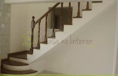 Imagem: A casa possui 4 Dormitórios, 2 Banheiros, 4 Vagas na garagem