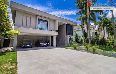 Imagem: A casa em condomínio possui 4 Dormitórios, 5 Banheiros, 5