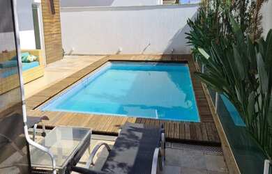 Imagem: A casa em condomínio possui 4 Dormitórios, 5 Banheiros, 5