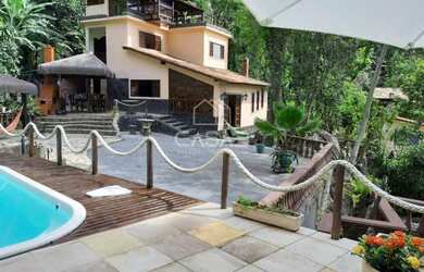 Imagem: A casa em condomínio possui 4 Dormitórios, 5 Banheiros, 2