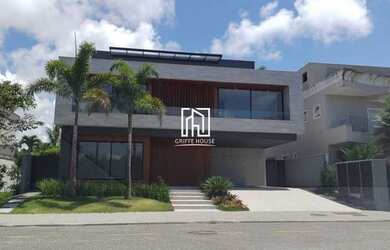 Imagem: A casa em condomínio possui 5 Dormitórios, 5 Banheiros, 4