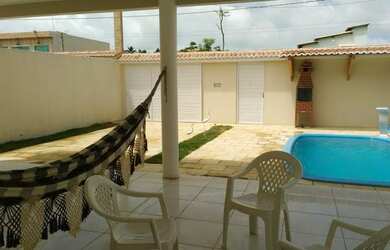 Imagem: A casa possui 2 Dormitórios, 3 Banheiros, 3 Vagas na garagem