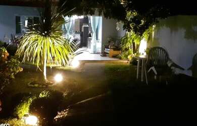 Imagem: A casa possui 3 Dormitórios, 5 Vagas na garagem, Churrasqueira