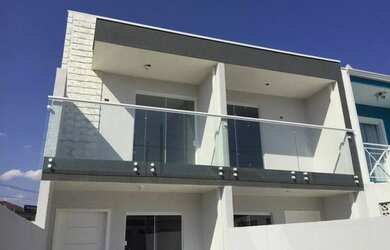 Imagem: A casa possui 2 Dormitórios, 2 Banheiros, 2 Vagas na garagem