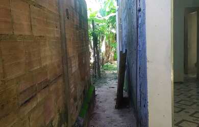 Imagem: A casa possui 2 Dormitórios, 2 Banheiros, 3 Vagas na garagem