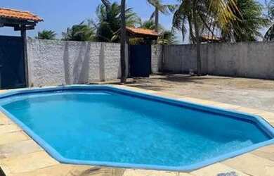 Imagem: A casa possui 4 Dormitórios, 5 Vagas na garagem e está localizado