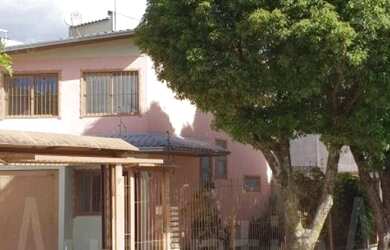 Imagem: A casa possui 3 Dormitórios, 2 Banheiros, 2 Vagas na garagem