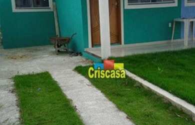 Imagem: A casa possui 2 Dormitórios, 2 Banheiros, 2 Vagas na garagem