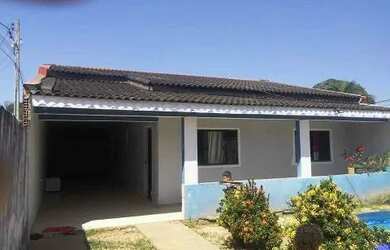 Imagem: A casa possui 3 Dormitórios, 2 Banheiros, 1 Vaga na garagem