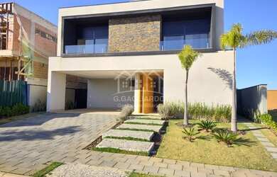 Imagem: A casa possui 5 Dormitórios, 5 Banheiros, 5 Vagas na garagem