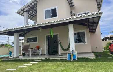 Imagem: A casa possui 3 Dormitórios, 3 Vagas na garagem e está localizado