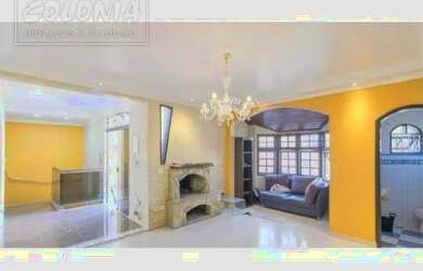 Imagem: A casa possui 4 Dormitórios, 4 Banheiros, 4 Vagas na garagem