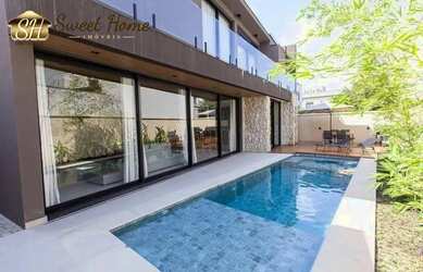 Imagem: A casa possui 5 Dormitórios, 5 Banheiros, 5 Vagas na garagem