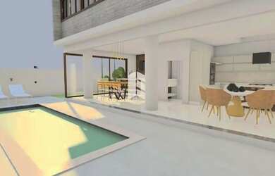 Imagem: A casa possui 3 Dormitórios, 5 Banheiros, 2 Vagas na garagem