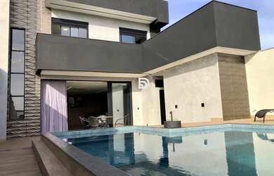 Imagem: A casa possui 5 Dormitórios, 5 Banheiros, 5 Vagas na garagem