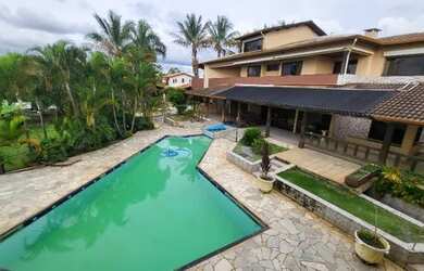 Imagem: A casa em condomínio possui 5 Dormitórios, 5 Banheiros, 5