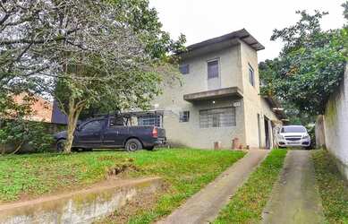 Imagem: A casa possui 2 Dormitórios, 2 Banheiros, 1 Vaga na garagem