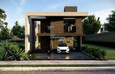 Imagem: A casa possui 3 Dormitórios, 2 Banheiros, 3 Vagas na garagem