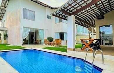 Imagem: A casa em condomínio possui 4 Dormitórios, 5 Banheiros, 2