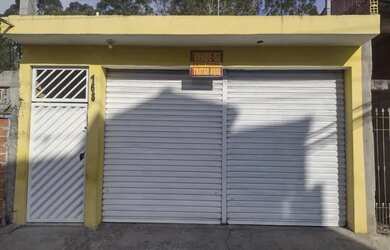 Imagem: A casa possui 4 Dormitórios, 2 Banheiros, 2 Vagas na garagem