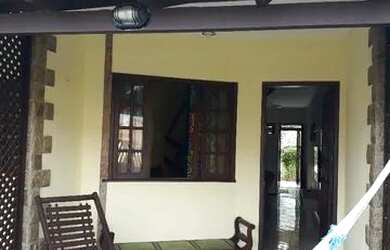 Imagem: A casa possui 3 Dormitórios, 2 Vagas na garagem e está localizado